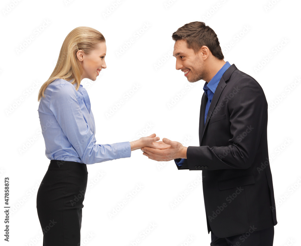 man and woman showing something on the palms