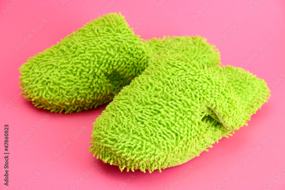 Fototapeta premium bright slippers, on pink background
