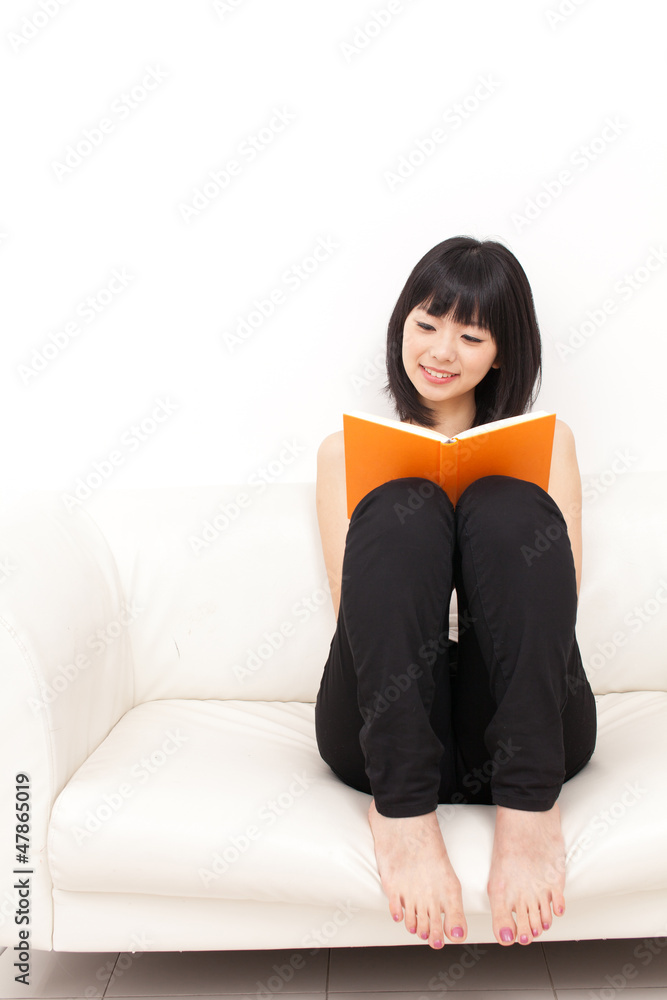 attractive asian woman reading a book attractive asian woman reading a book