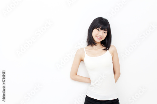 attractive asian woman relxing on white background photo