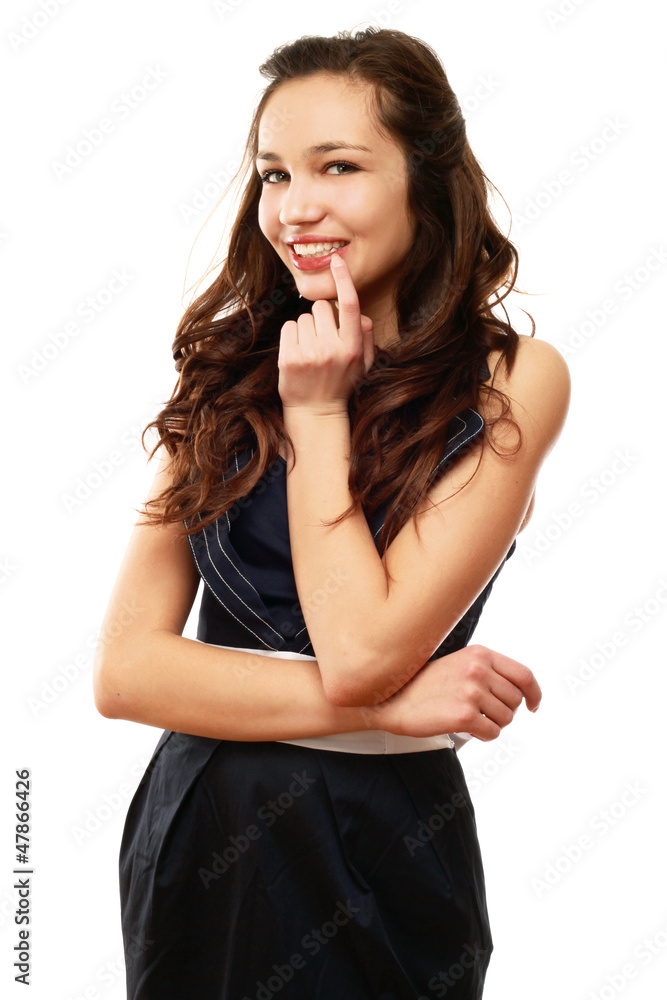 A beautiful woman in a black dress looking aside A beautiful woman in a black dress looking aside