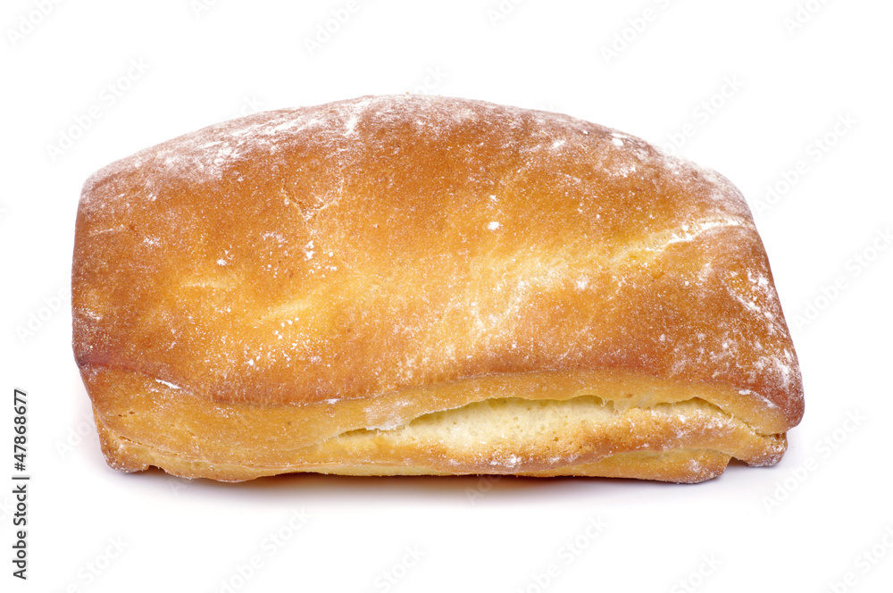 Bun with sugar on the white background Bun with sugar on the white background