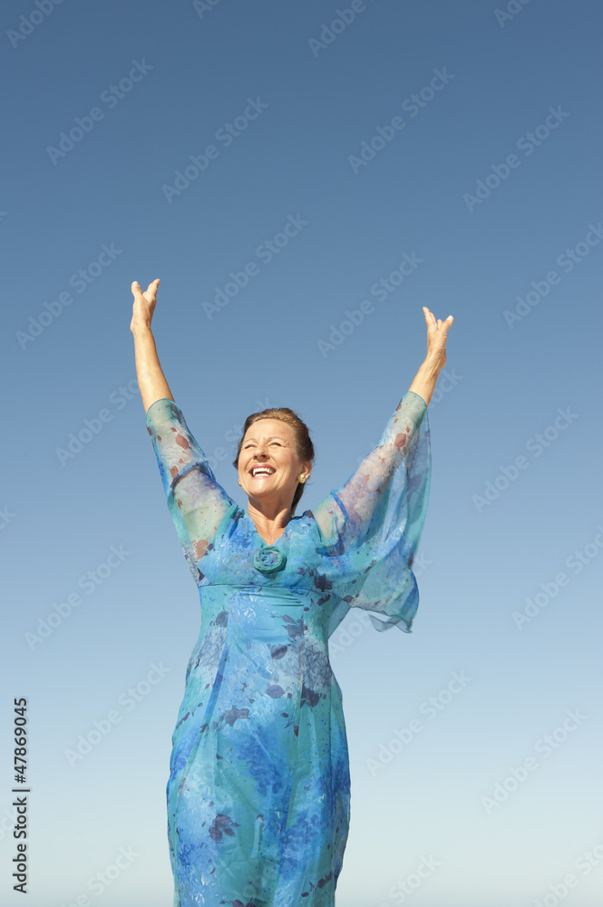 Portrait joyful mature woman isolated sky Portrait joyful mature woman isolated sky
