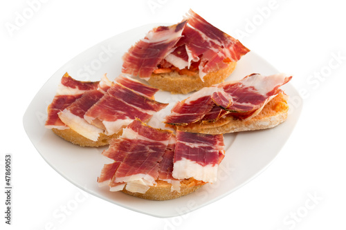 Spanish tapas, ham and tomato