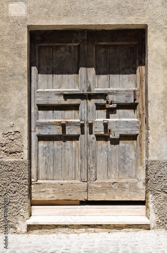 Wooden door. Tarquinia. Lazio. Italy. photo