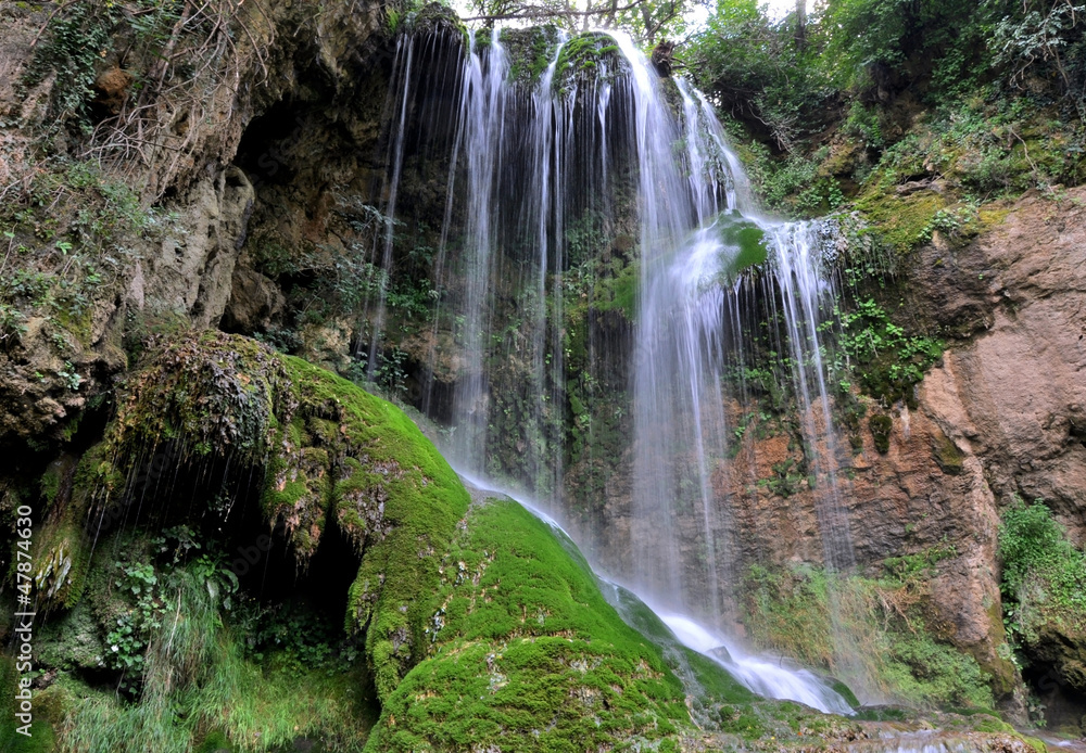 Fototapeta premium Falls above the entrance of the cave in Bulgaria