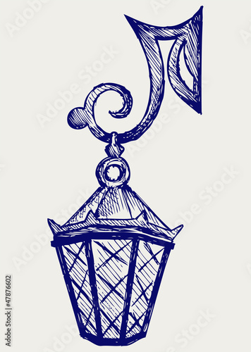 Lantern from the forged metal. Doodle style