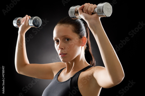 Fitness woman young sportive weights exercise