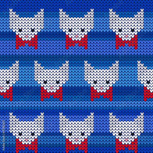 White cats with red ribbons