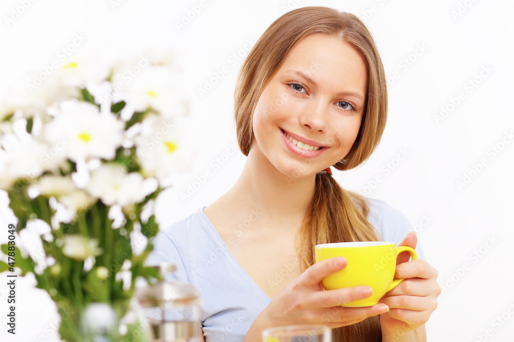 Beautiful young woman drinking tea Beautiful young woman drinking tea