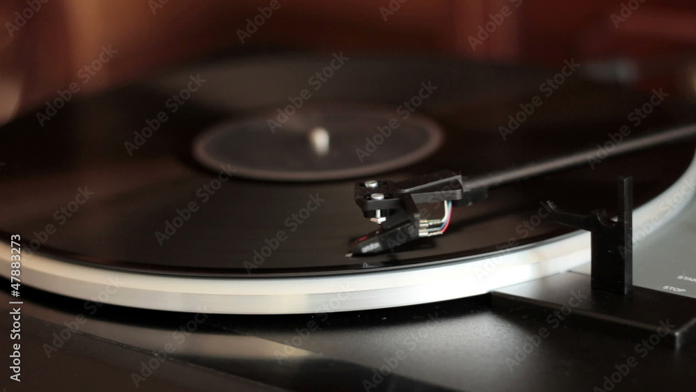 Vinyl rotating on a turntable Vinyl rotating on a turntable