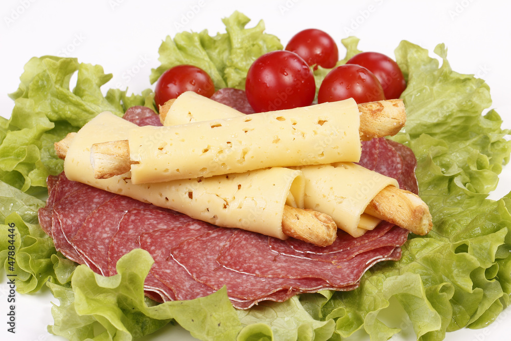 Salty cheese crackers with salami and tomatoes Salty cheese crackers with salami and tomatoes