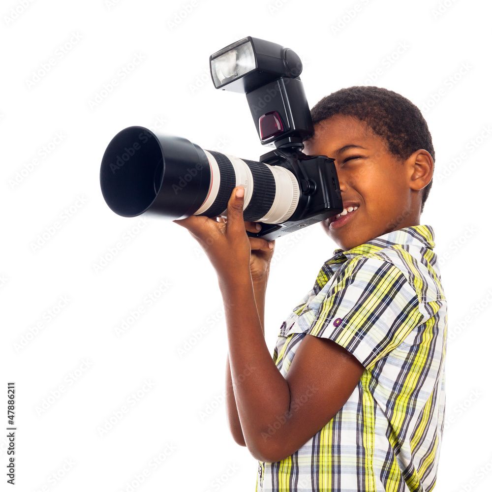 Fototapeta premium Child photographer with professional camera