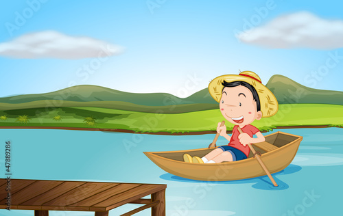 A boy rowing a boat