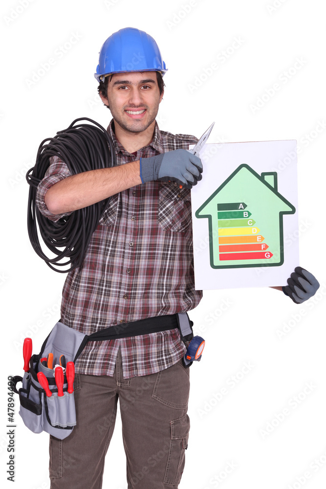craftsman holding an energy consumption label