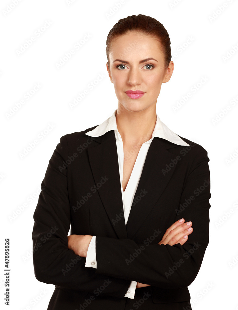 A beautiful woman standing with her arms crossed A beautiful woman standing with her arms crossed