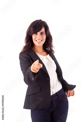 Smiling woman pointing up