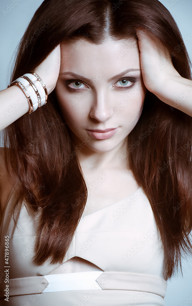 Naklejka premium Portrait of beautiful young woman with makeup