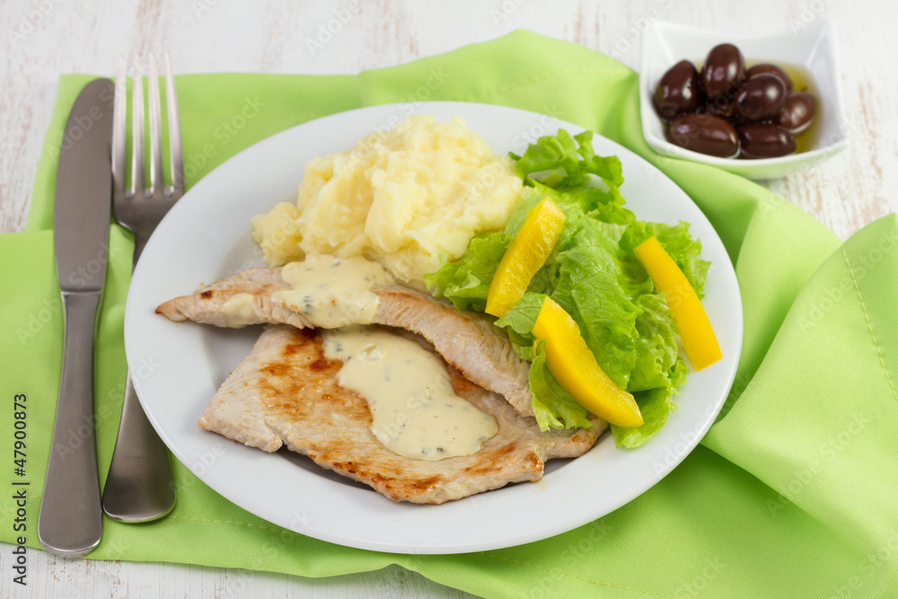 fried turkey with sauce, mashed potato and salad fried turkey with sauce, mashed potato and salad
