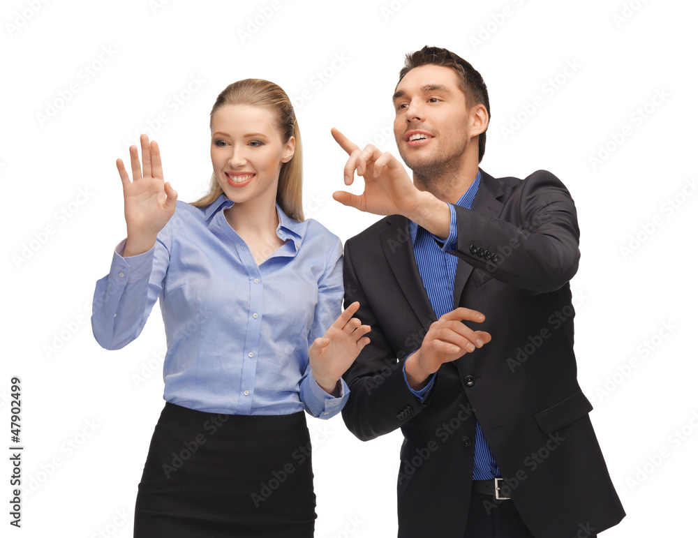 man and woman working with something imaginary man and woman working with something imaginary