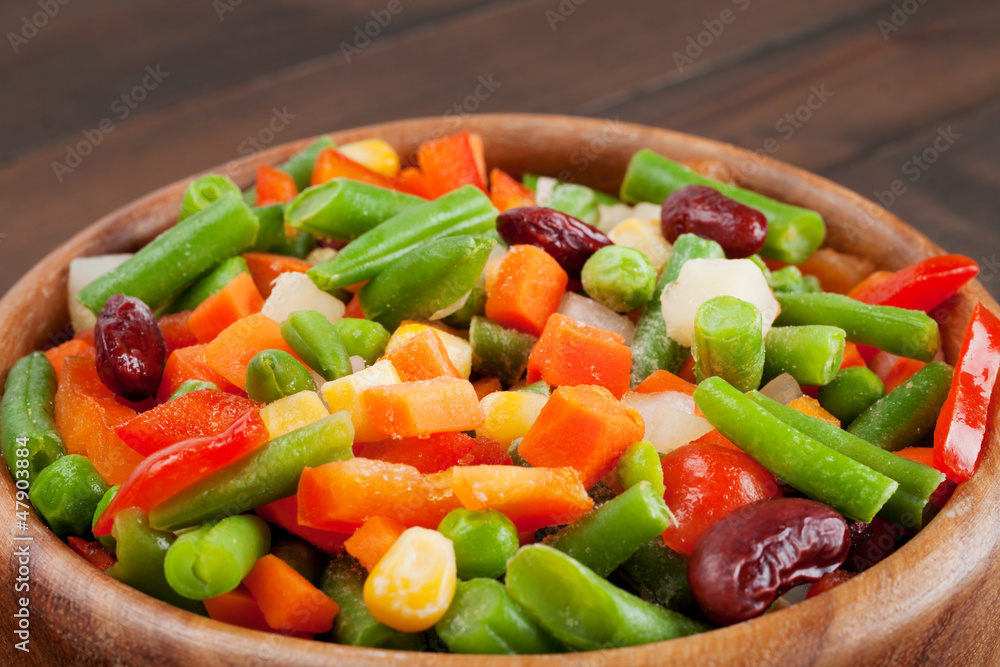 mixed vegetables in wooden bowl