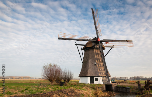 Historic windmill in a Dutch polder landscape