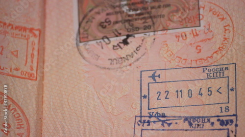 A passport with visas and stamps 