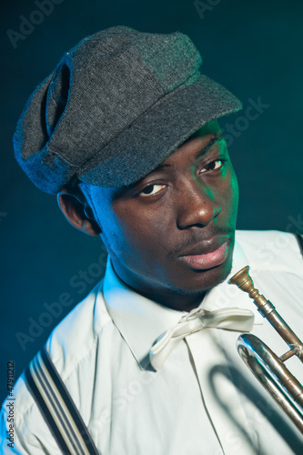 Photography Black american jazz trumpet player. Vintage. Studio shot.