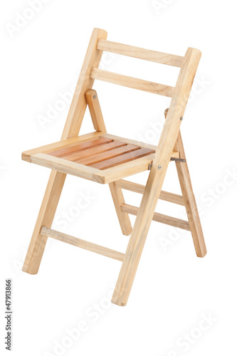 Small folding wooden chair on white background