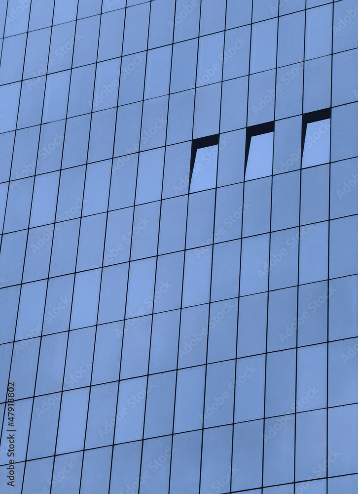 open windows on a glass building open windows on a glass building
