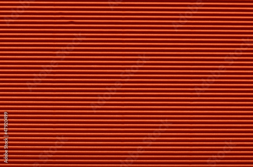 Texture of red corrugated paper for background used