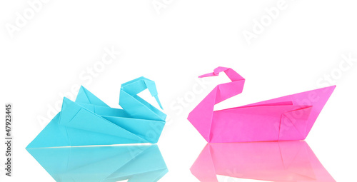 Origami swans isolated on white