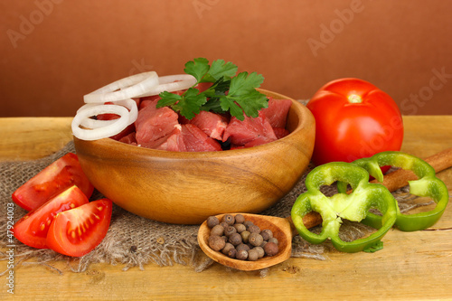 Raw beef meat with herbs and spices