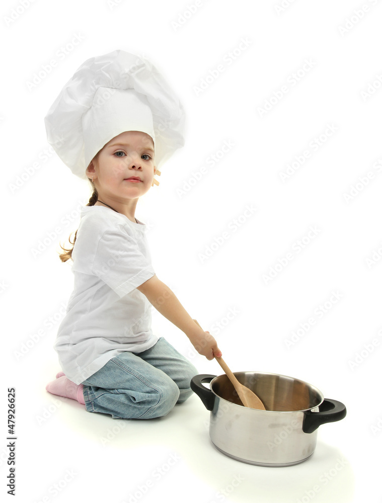 little girl doctor in chef's hat with pan and spoon, isolated little girl doctor in chef's hat with pan and spoon, isolated