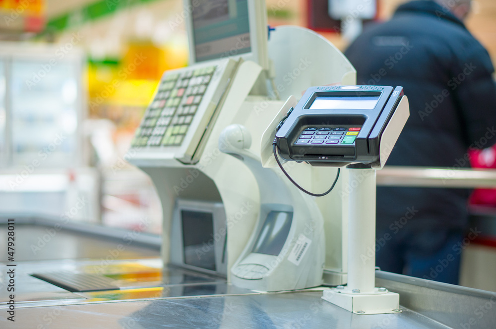 Empty cash desk with terminal in supermarket Empty cash desk with terminal in supermarket