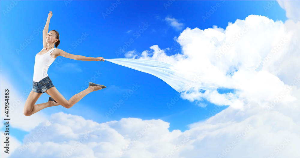 Modern style dancer against blue sky Modern style dancer against blue sky