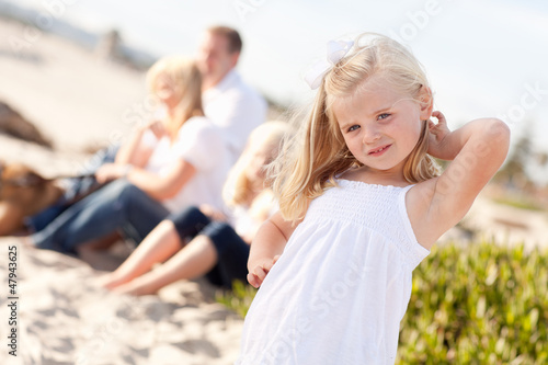 Adorable Little Blonde Girl Having Fun At the Beach