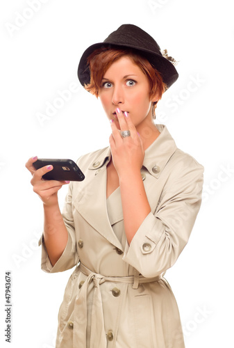Shocked Young Woman Holding...