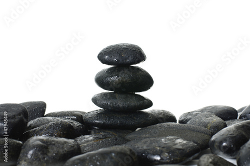 stones stack in balance on pebble