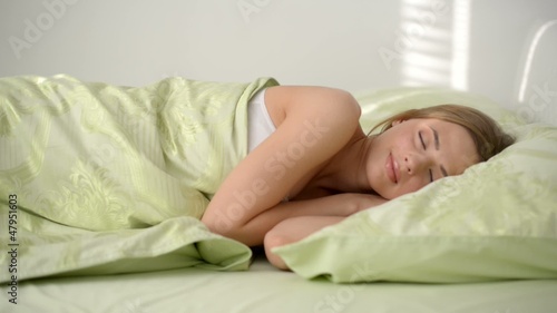 young beautiful girl on bed