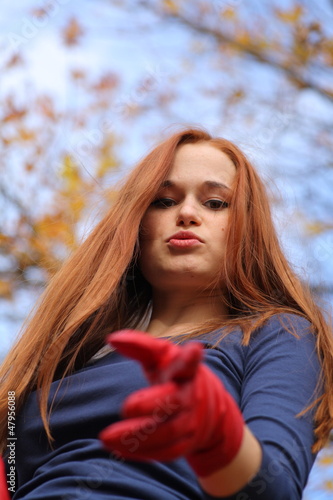 beautiful red-headed girl posing