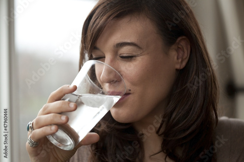 Young Woman Drinking Water