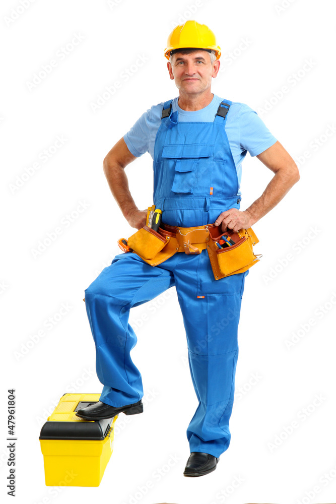 Male builder in yellow helmet isolated on white Male builder in yellow helmet isolated on white