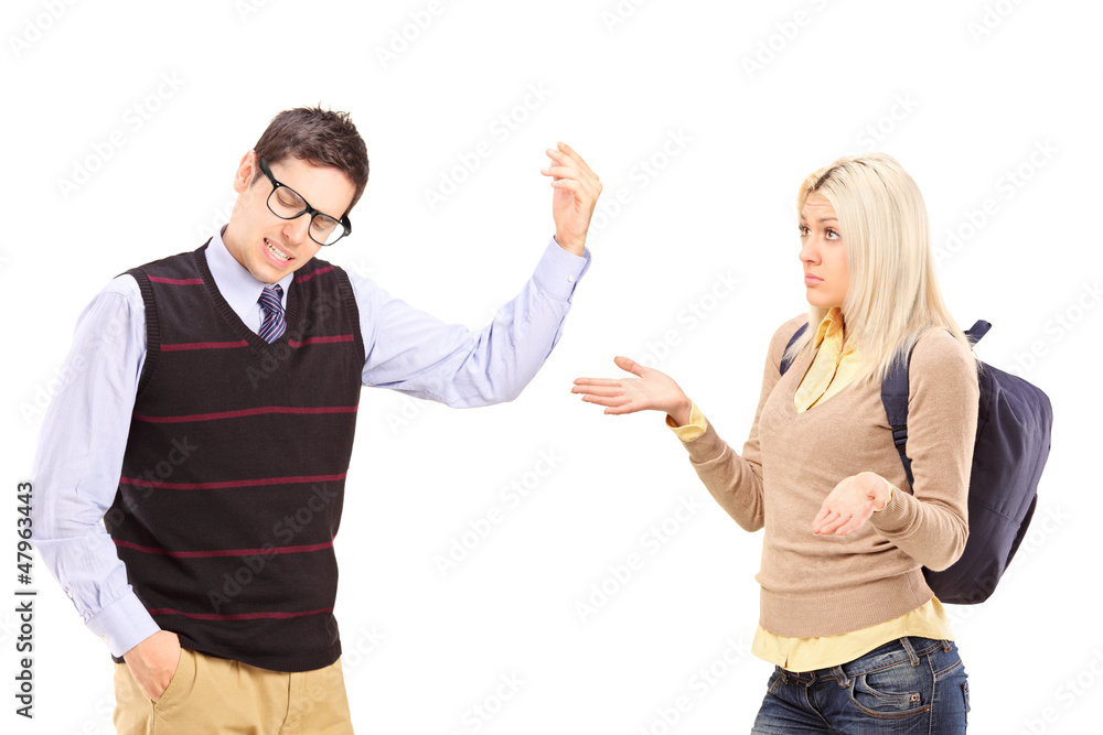 Young male and female student arguing