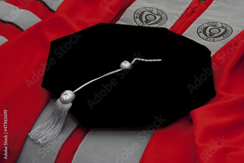 фотографія Academic regalia - PhD gown and tam