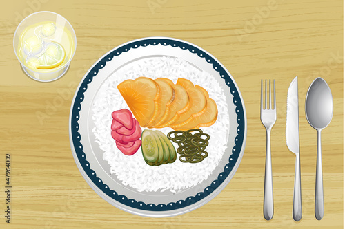 Garnished rice with fruit slices in dish