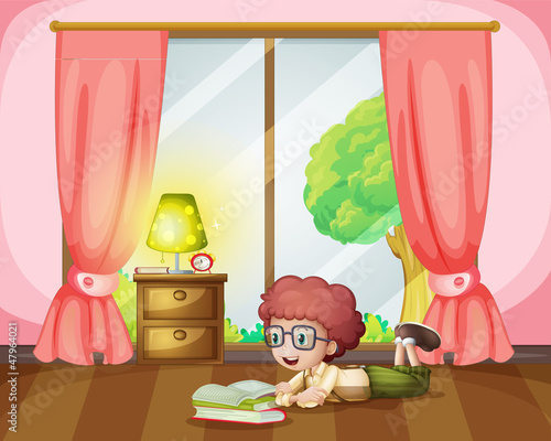 Girl lying and reading in room