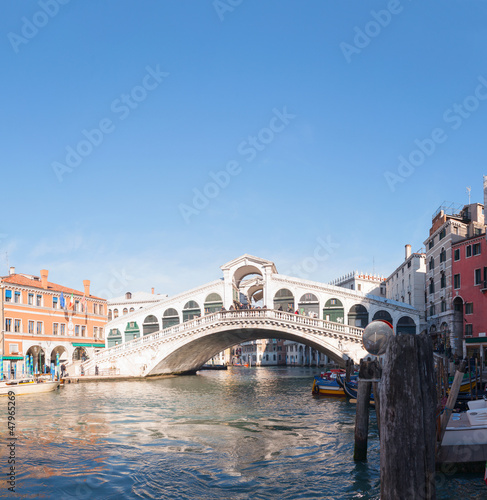 Rialto Bridge (Ponte Di Rialto) in Venice, Italy on a sunny day