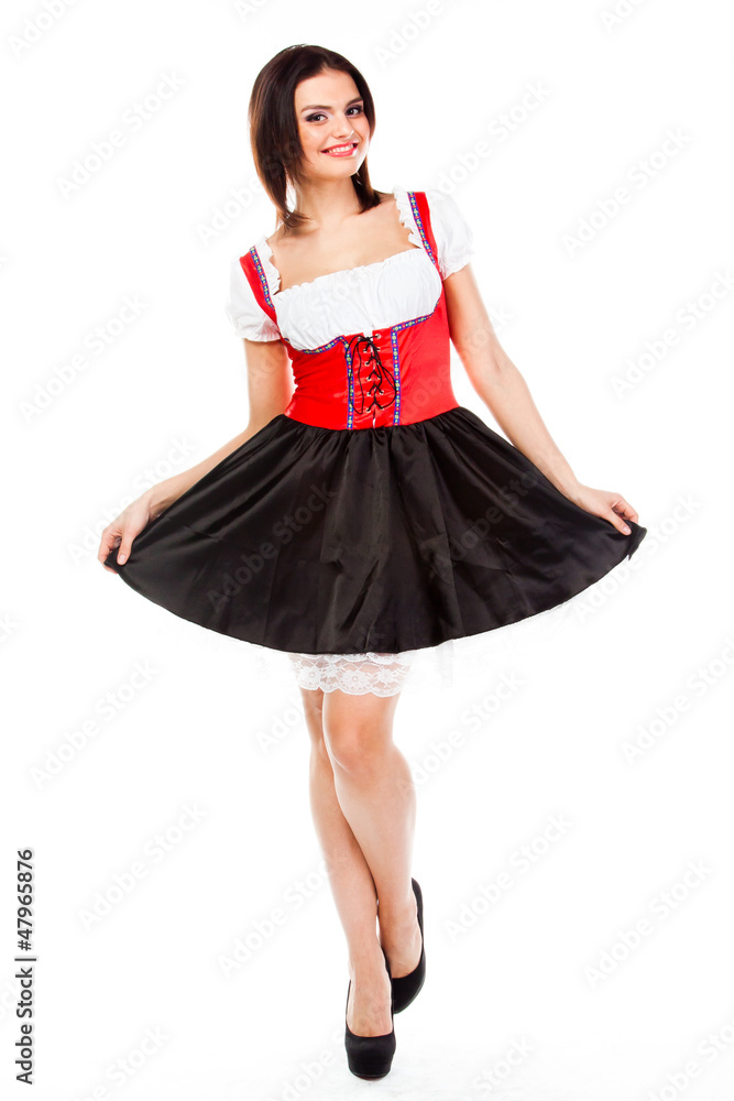 young and beautiful woman in a traditional Bavarian dress young and beautiful woman in a traditional Bavarian dress