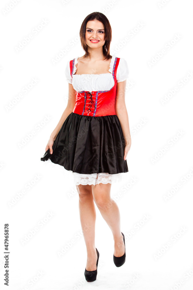 young and beautiful woman in a traditional Bavarian dress young and beautiful woman in a traditional Bavarian dress
